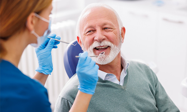 dentist taking out tooth image